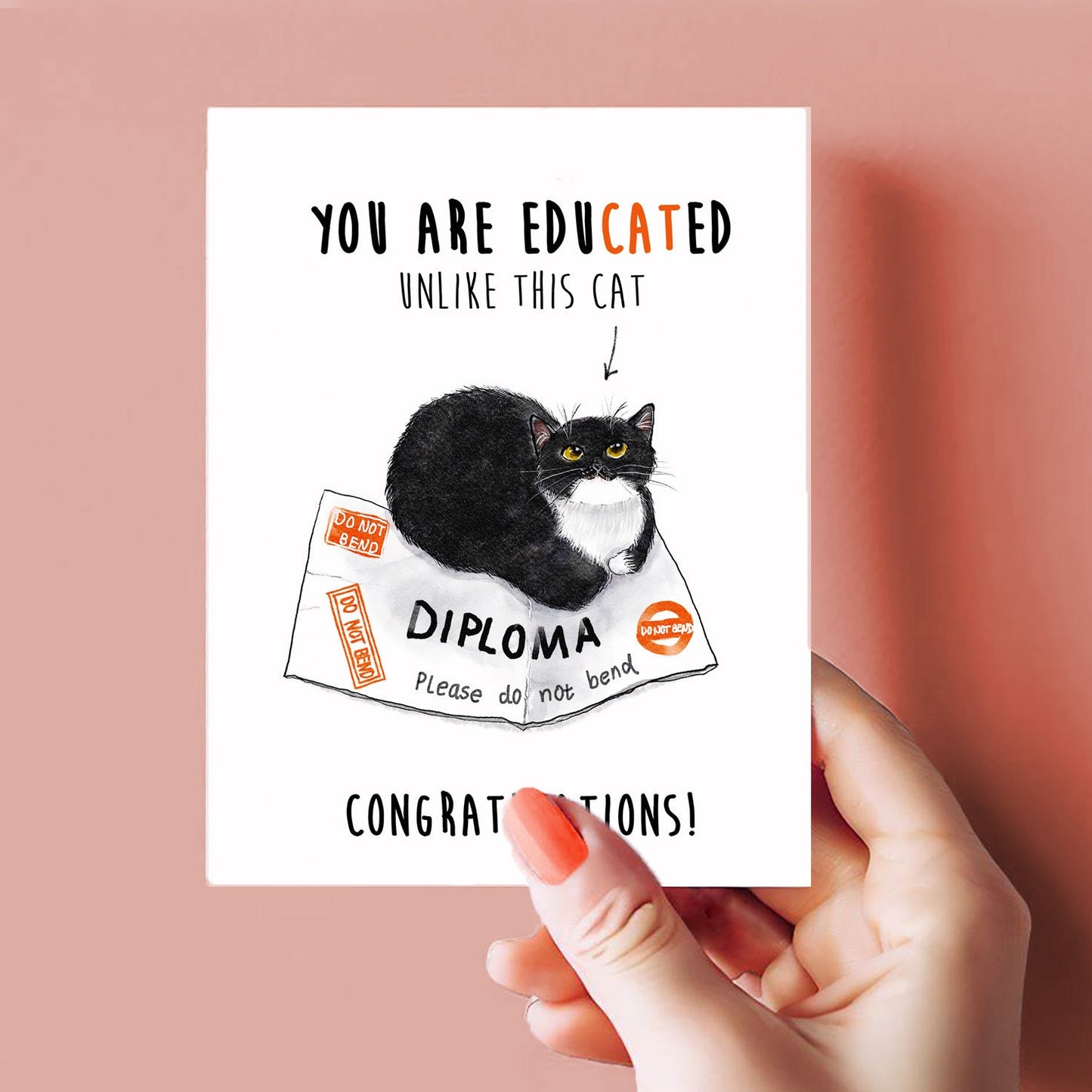 Black and white tuxedo cat lounges on a bent diploma in a cute and funny graduation card. Caption: 'You are edu-cat-ed, unlike this cat—congratulations!' Ideal for cat lovers and recent grads with a sense of humor.
