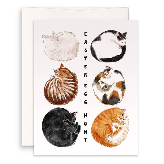 Easter Egg Hunt card featuring six cats curled up like eggs: white cat, black cat, tuxedo cat, brown tabby cat, calico cat, and an orange cat mom with her kitten. Perfect for cat lovers!